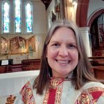 Rachel wearing church robes